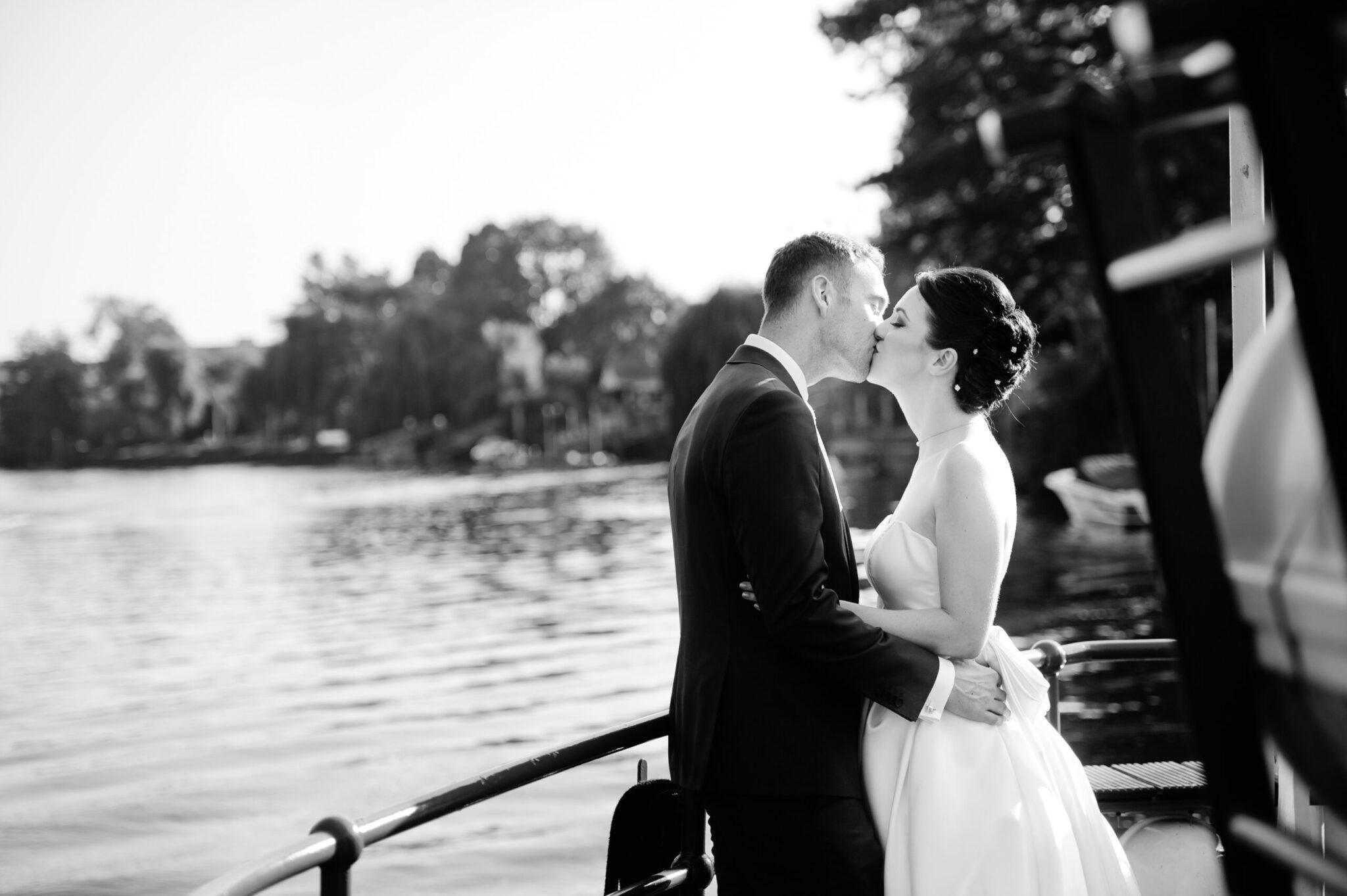 Richmond Upon Thames Bingham Riverhouse wedding couple on a boat